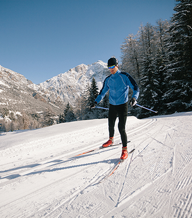 Nordic/Cross Country skier on groomed trail