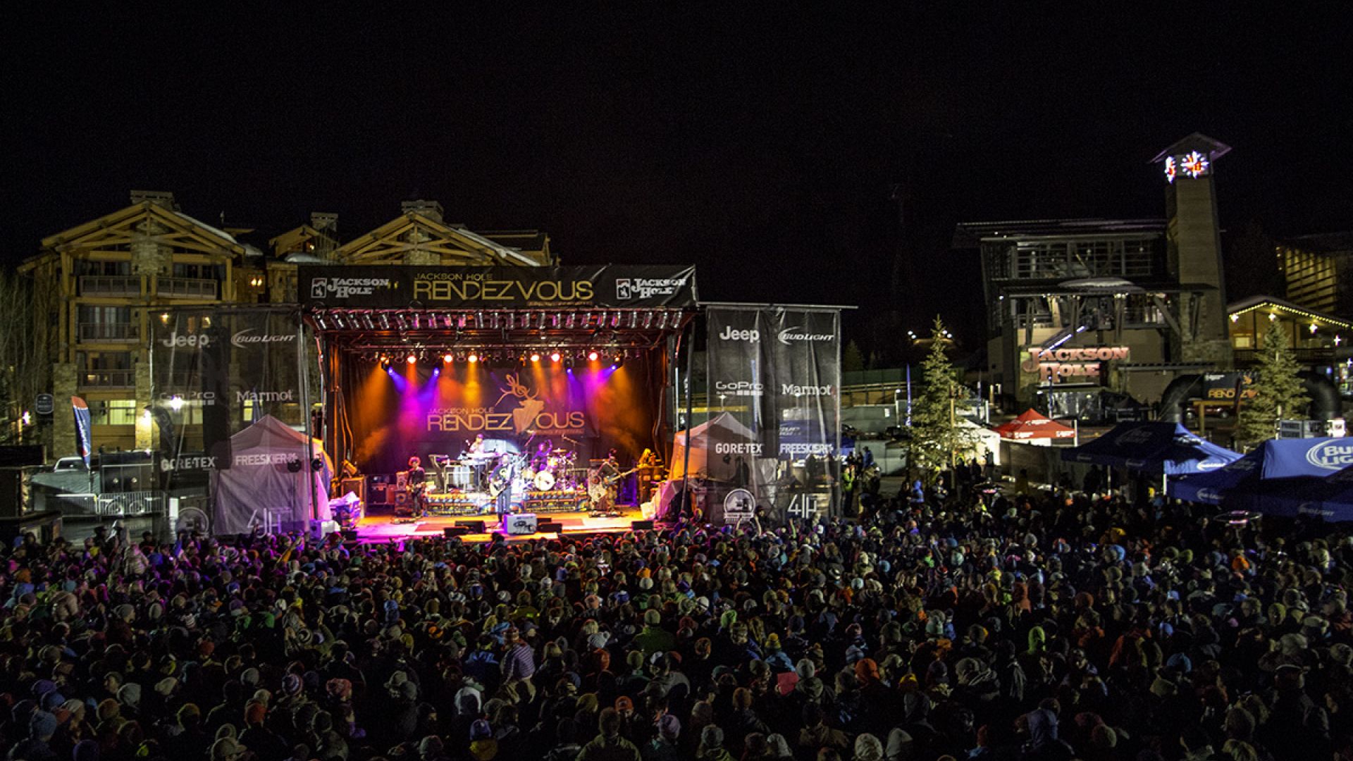 Jackson Hole Rendezvous Festival 2018 nighttime view of band on stage and crowd