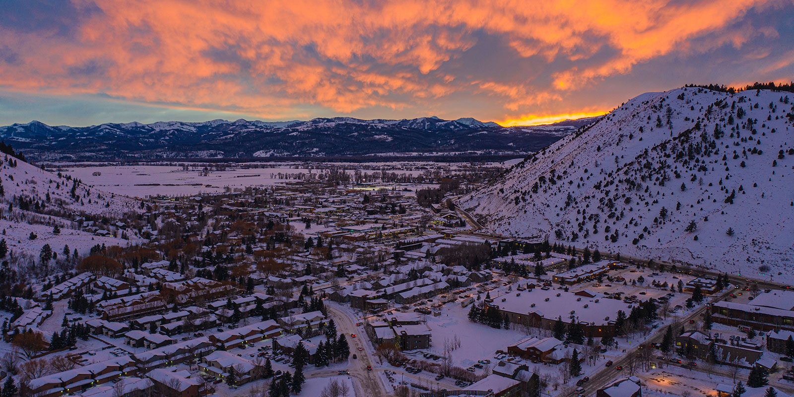 View over Jackson WY at sunset in winter from mountain top