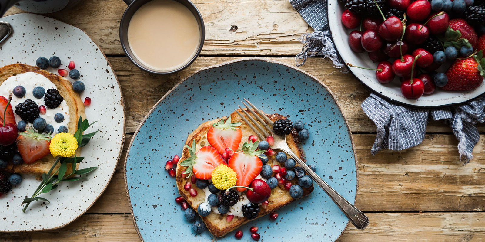Breakfast plate with toast, yogurt and berries
