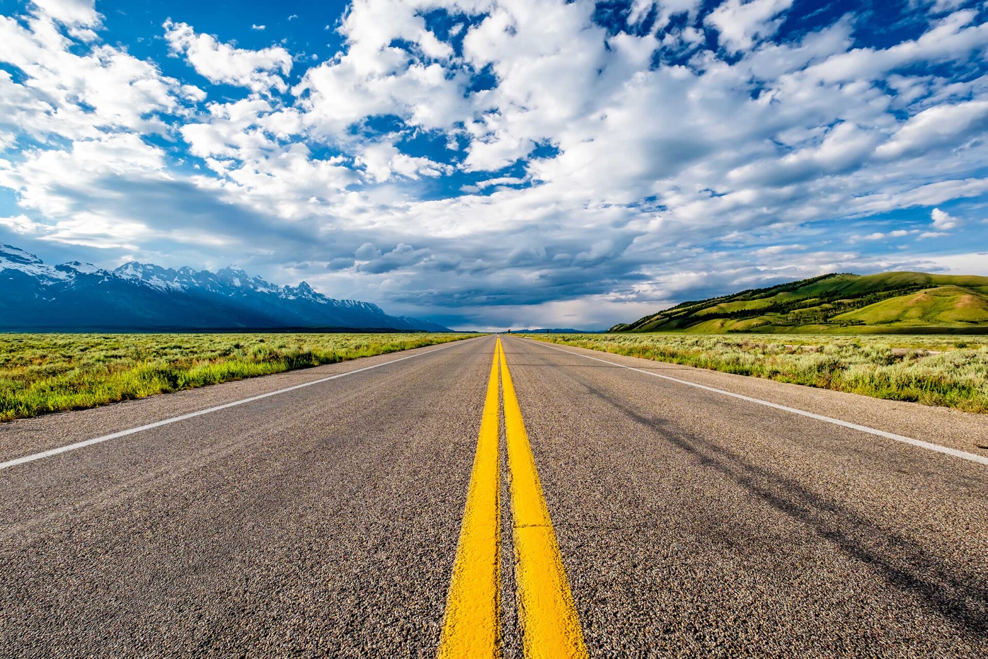 Empty Open Highway In Wyoming Near the Tetons